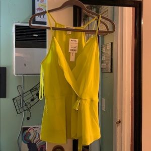 Yellow wrap tank.  Never been worn.